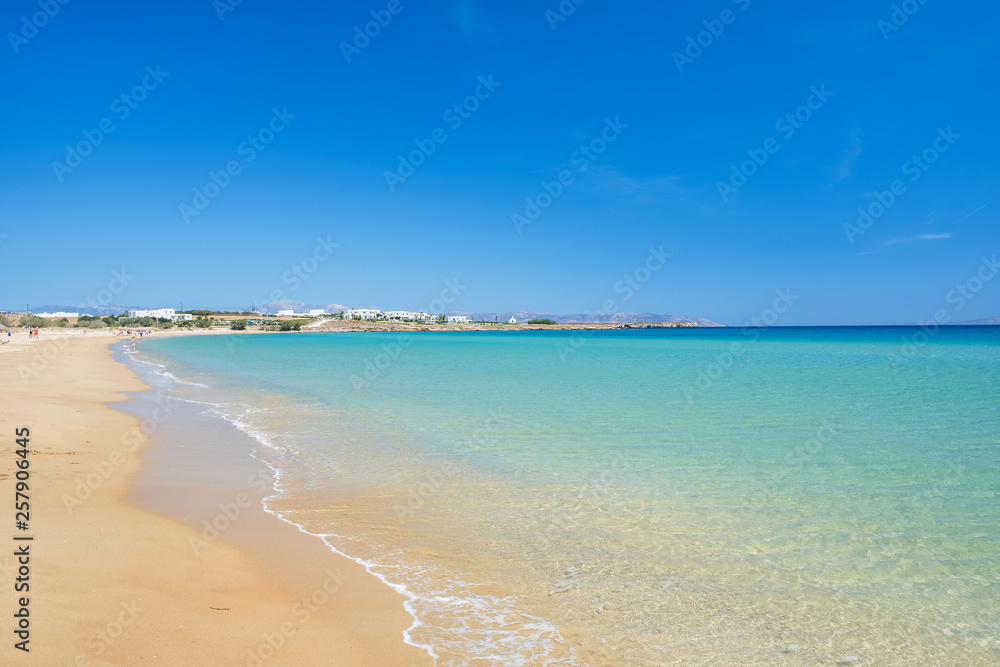 Sandy beach with amazing tranquil water on Paros island, Greece.