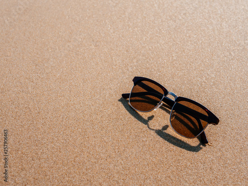 Sunglasses on the beach.
