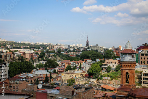 View of the city from the observation deck. The capital of Georgia is Tbilisi. Old city. The Kura River. Red roofs, low buildings. Panorama, architecture, urban