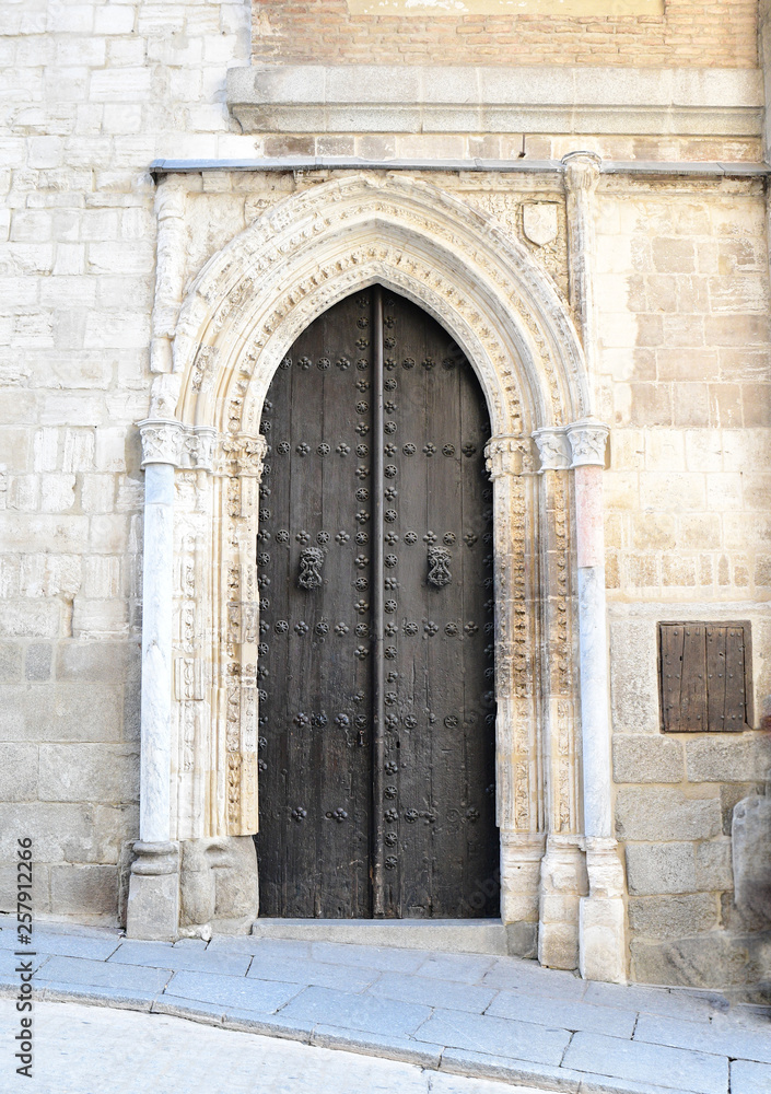 One of the lateral entrance gates of the cathedral at Toledo.