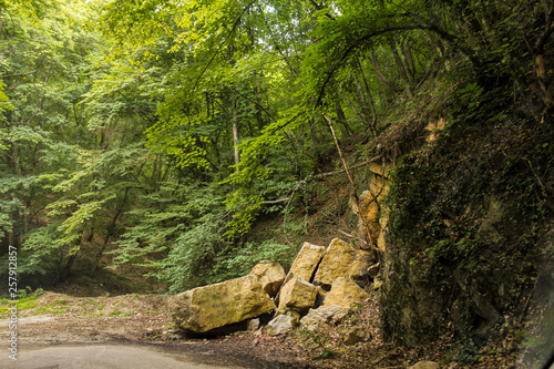 Stone collapse by the road.