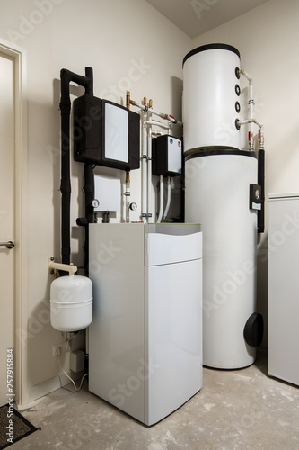 Modern sustainable heat pump installation for heating water and houses