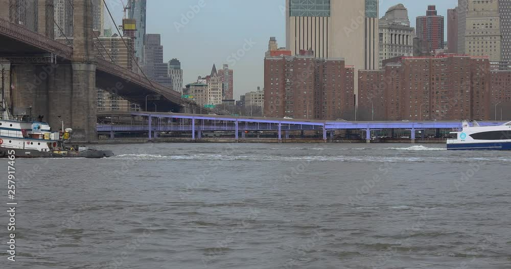 Brooklyn Bridge, World Trade Center WTC known as the Freedom Tower and the FDR Highway in Manhattan, New York City, NY. Brooklyn Bridge, World Trade Center WTC known as the Freedom Tower and the FDR Highway in Manhattan, New York City, NY.