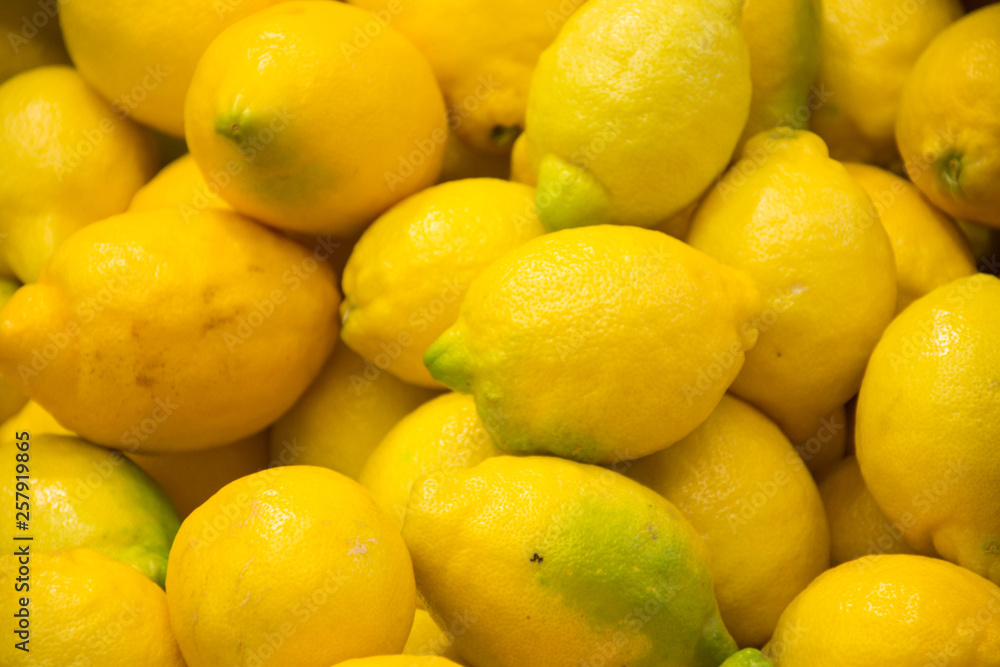 Group of fresh lemons for sale in the market Group of fresh lemons for sale in the market