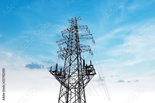 High voltage electric tower in the blue sky white cloud backgrou