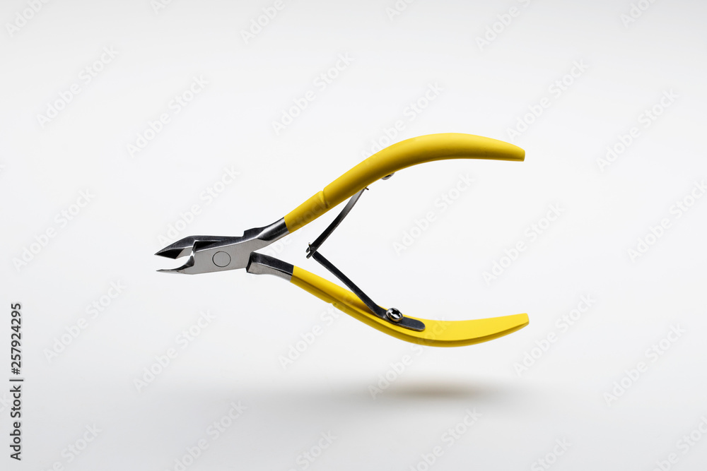 Nail clipper floating on white background Nail clipper floating on white background