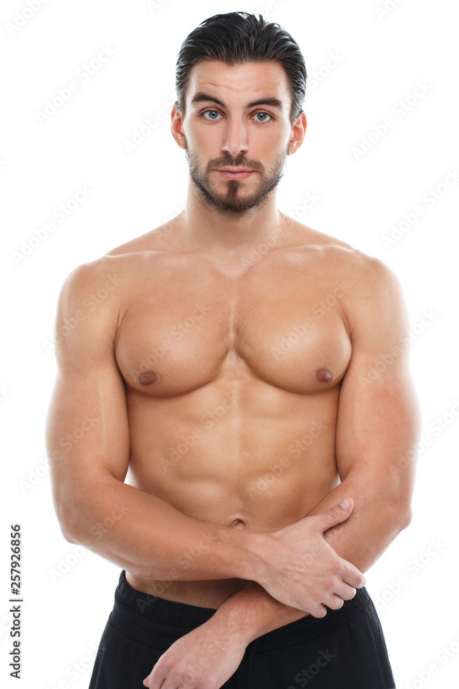 Cute athletic man with a naked torso isolated on white background.