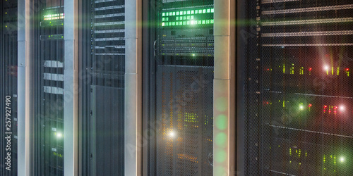 Supercomputer big server rack. Image contains noise.