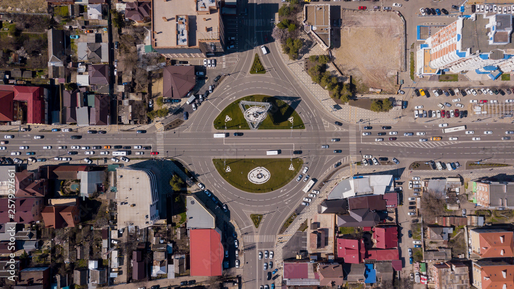 Top down view of road roundabout, junction route traffic