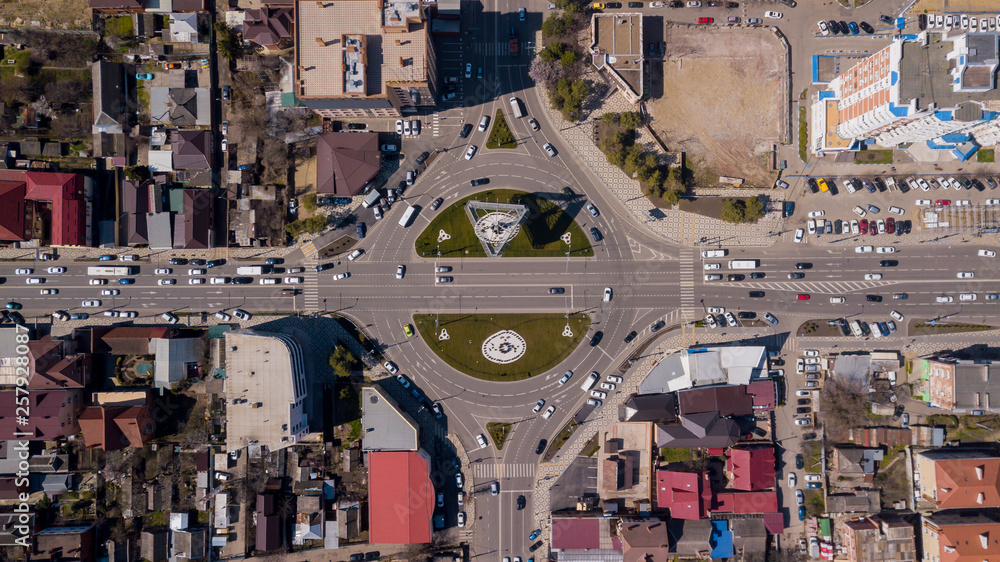 Top down view of urban road traffic, roundabout, junction route traffic