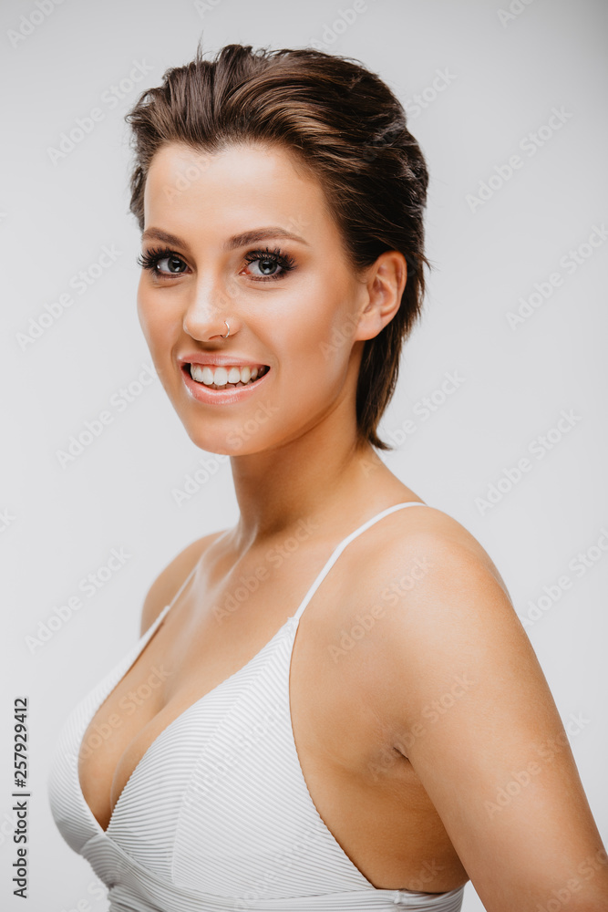 Beautiful Caucasian Brunette Girl on White Backdrop Beautiful Caucasian Brunette Girl on White Backdrop
