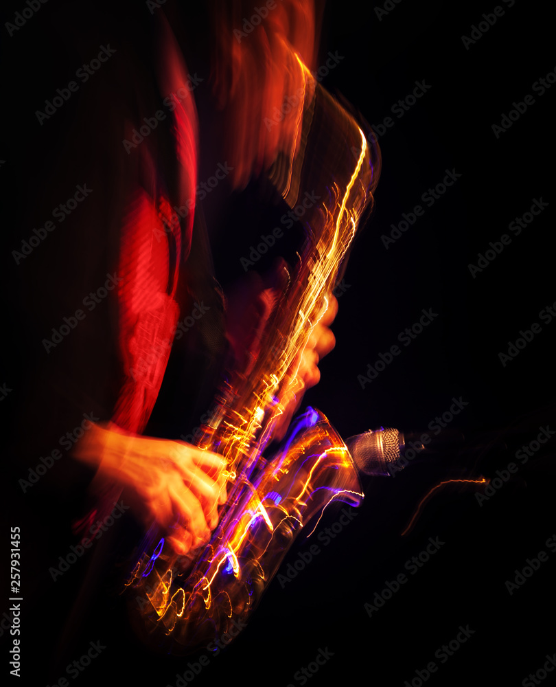 Obraz premium Saxophone player performing on stage