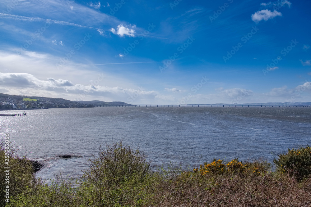 Beautiful Tay and the Tay Rail Bridge in Dundee with Clear blue Skys in Scotland
