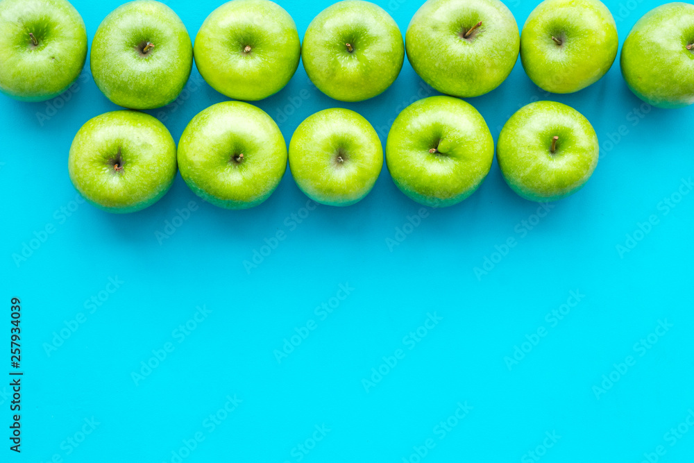 summer fruit pattern with apples on blue colorful background top view copyspace summer fruit pattern with apples on blue colorful background top view copyspace