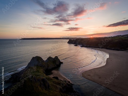 Aerial view of Three Cliffs Bay south coast beach the Gower Peninsula Swansea Wales uk