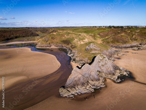 Aerial view of Three Cliffs Bay south coast beach the Gower Peninsula Swansea Wales uk photo