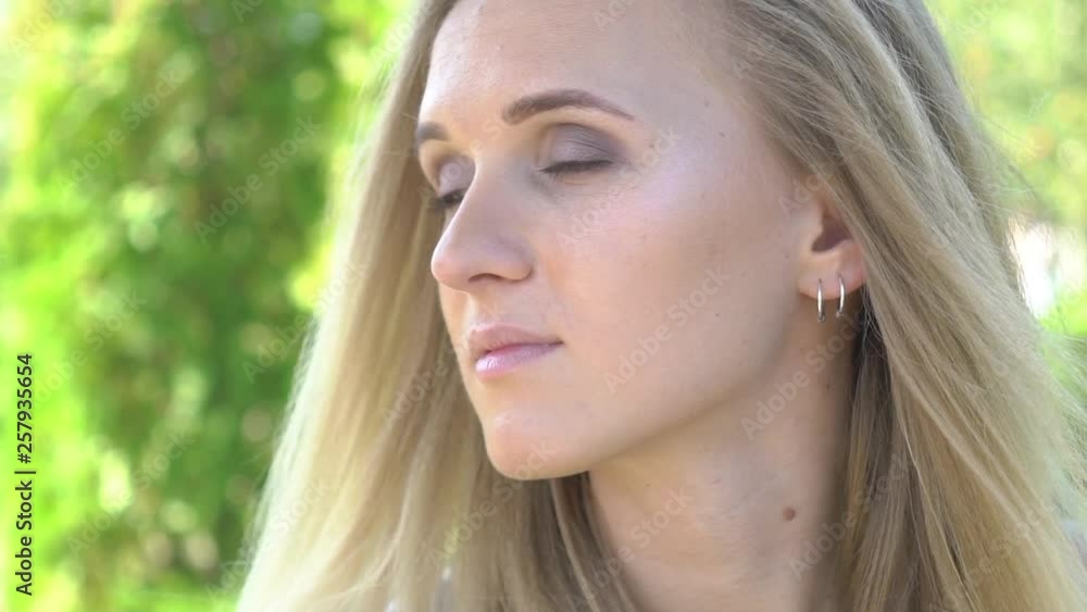 Slow Motion Portrait Of Beautiful Young Woman Close-Up Slow Motion Portrait Of Beautiful Young Woman Close-Up
