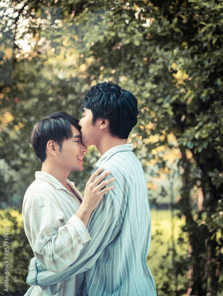 Sweet gay couple happy in love at home. Sweet gay couple happy in love at home.