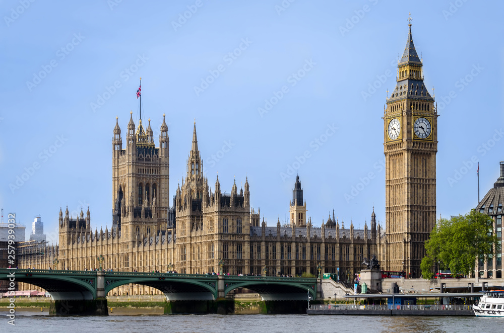 London city / England - May 2014: Big Ben and Parliament building looking across river Thames London city / England - May 2014: Big Ben and Parliament building looking across river Thames