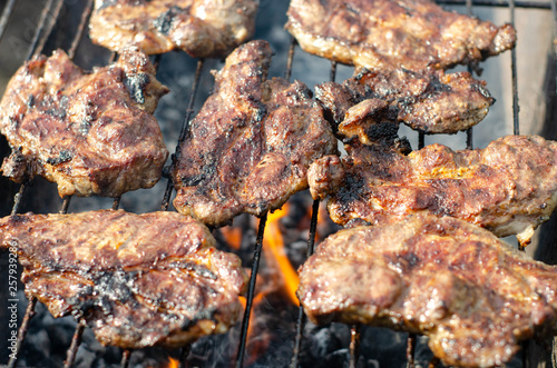 Pork steak on a fire grill