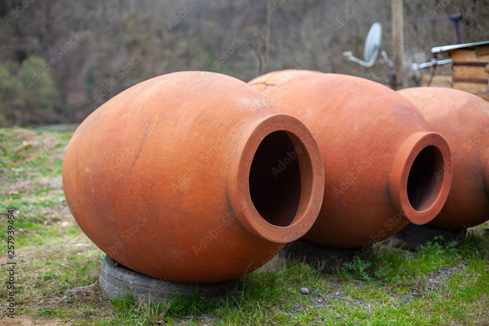 Georgian traditional jugs kvevri for wine, outdoor Georgian traditional jugs kvevri for wine, outdoor