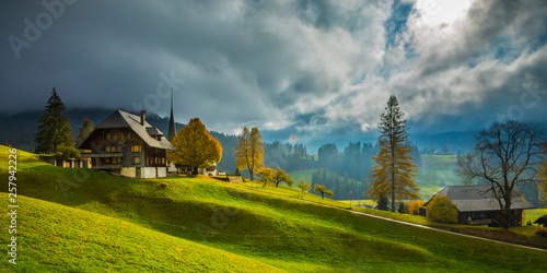 Scenic view of Emmental Valley against cloudy sky photo