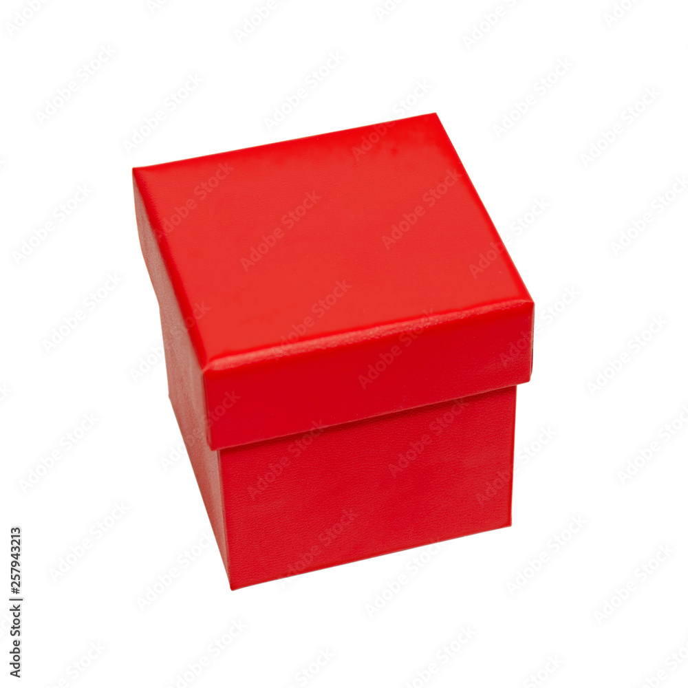 Red cardboard gift box. Packaging for shopping and gifts. Red box isolated. Tilted view Red cardboard gift box. Packaging for shopping and gifts. Red box isolated. Tilted view