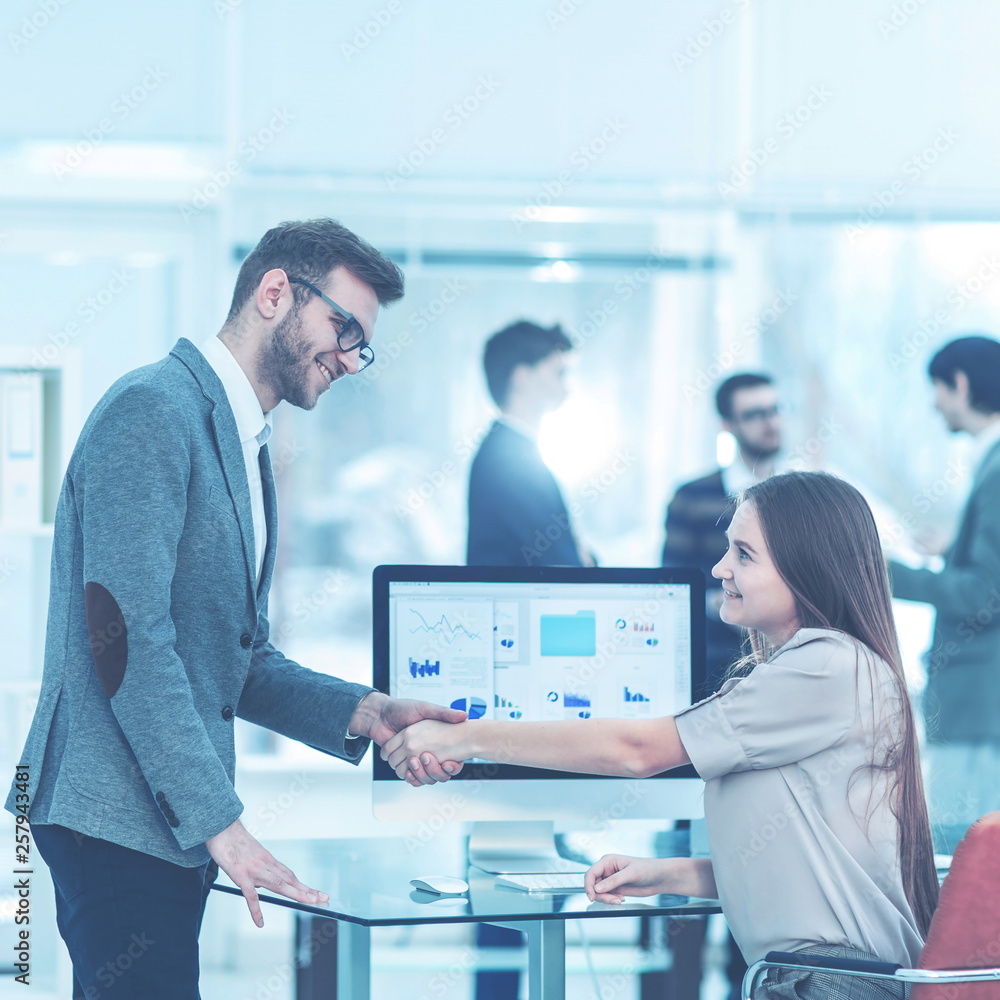 handshake between lawyer and client after reviewing the investment plan for development of the company. handshake between lawyer and client after reviewing the investment plan for development of the company.