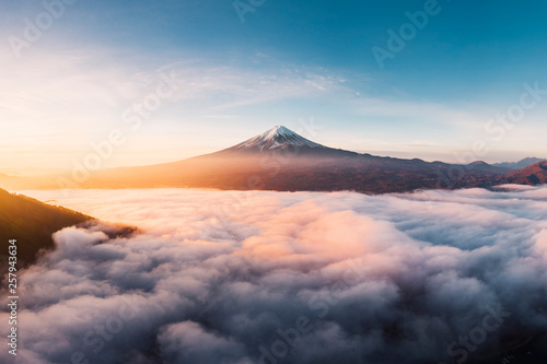 View of foggy lake with Mount Fuji during sunrise