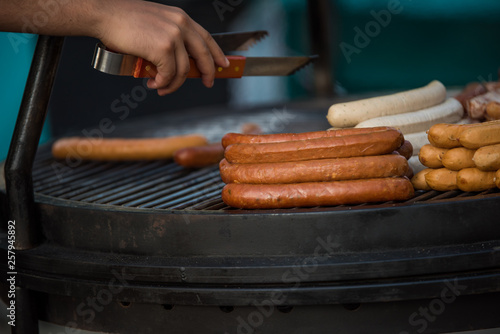 Hot Dogs on Grill Cooking