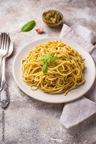 Italian spaghetti pasta with pesto sauce