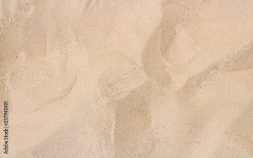 Sand , closeup of sand pattern of a beach in the summer