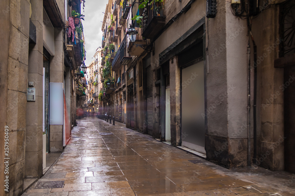 Long-exposure view of the Corders street in the Gothic Quarter in overcast day, Barcelona, Spain Long-exposure view of the Corders street in the Gothic Quarter in overcast day, Barcelona, Spain