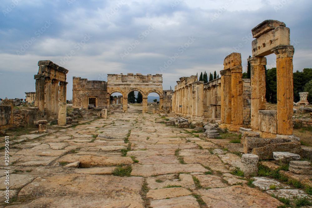 The ruins of the ancient ancient city of Hierapolis with columns, gates and graves in Pamukalle, Turkey