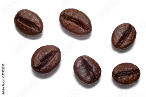 coffee grains closeup on a white background.