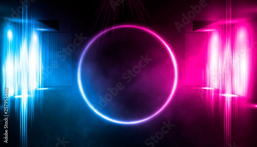 Background of empty stage, room. Reflection on wet pavement, concrete. Neon blurry lights. Neon circle figure in the center, smoke