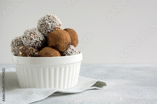 Homemade energy balls with cacao, coconut. Healthy food for children and vegan, sweets substitute.