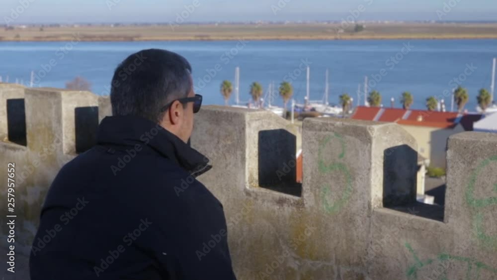 man watching on city and river man watching on city and river