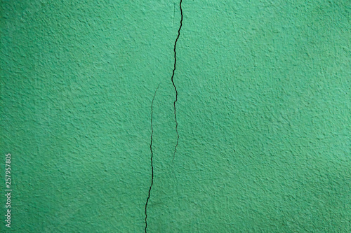 Crack of the wall in the office or on the facade of the building, background.