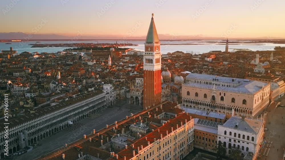 venice skyline aerial view drone shot at sunrise flight around orbit over st mark square italy