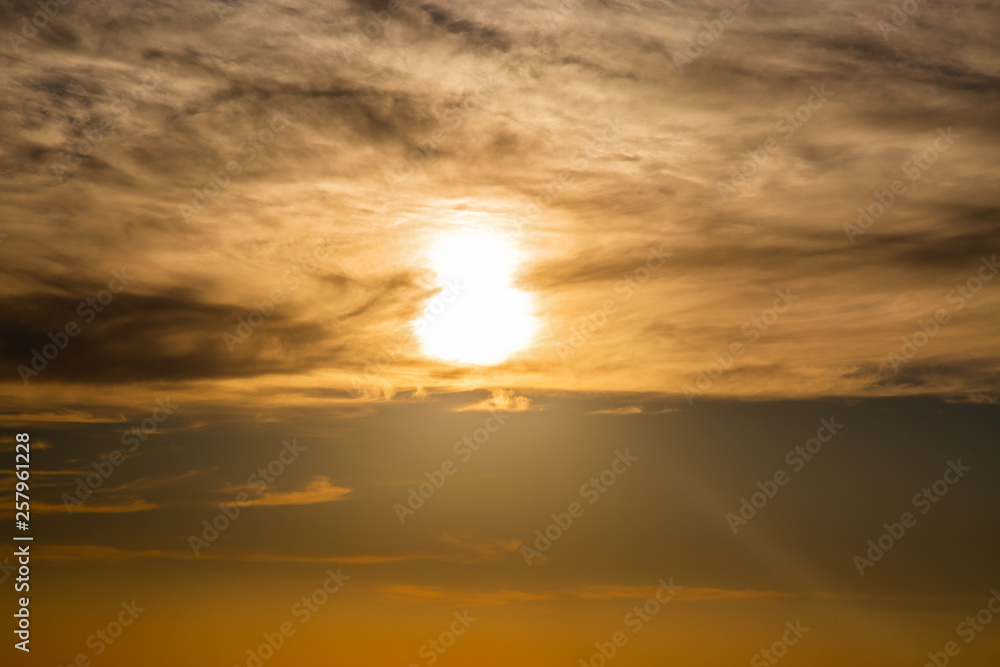 Texture. Sun on the clouds. Sunset. Last lights of sun Texture. Sun on the clouds. Sunset. Last lights of sun