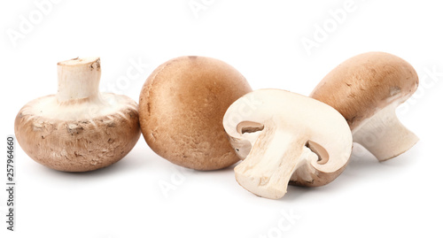 Fresh raw champignon mushrooms on white background
