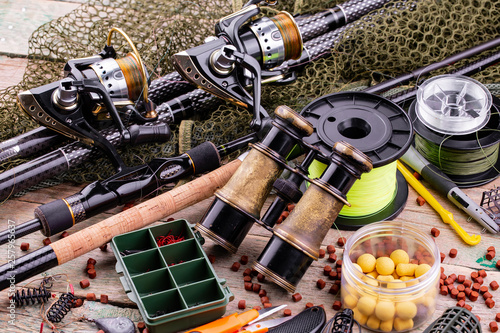 fishing tackle on a wooden table. 