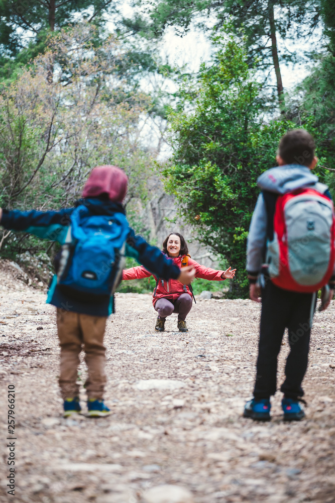 Children run to mother. Children run to mother.