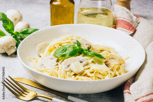 Pasta fettuccine with mushrooms and creamy cheese sauce