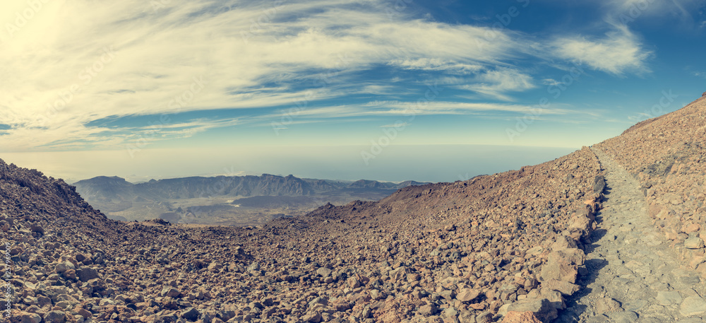 Hiking trail running through spectacular volcanic landscape.