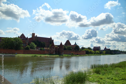 Malbork Castle across the river Nogat