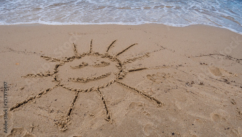 Sun smiling on the beach