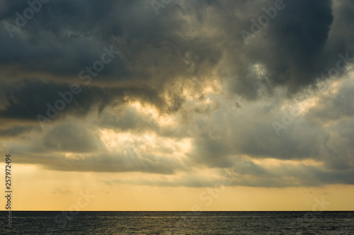 Amazing sea sunset, the sun, waves, clouds