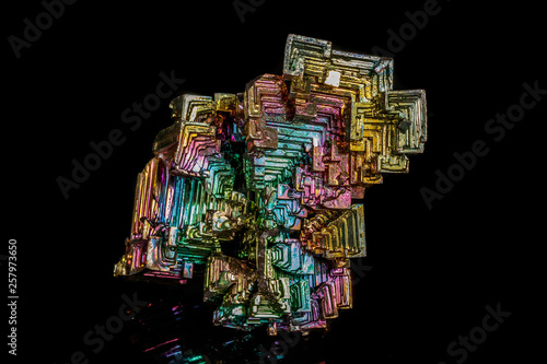 Macro of the stone bismuth mineral on a black background